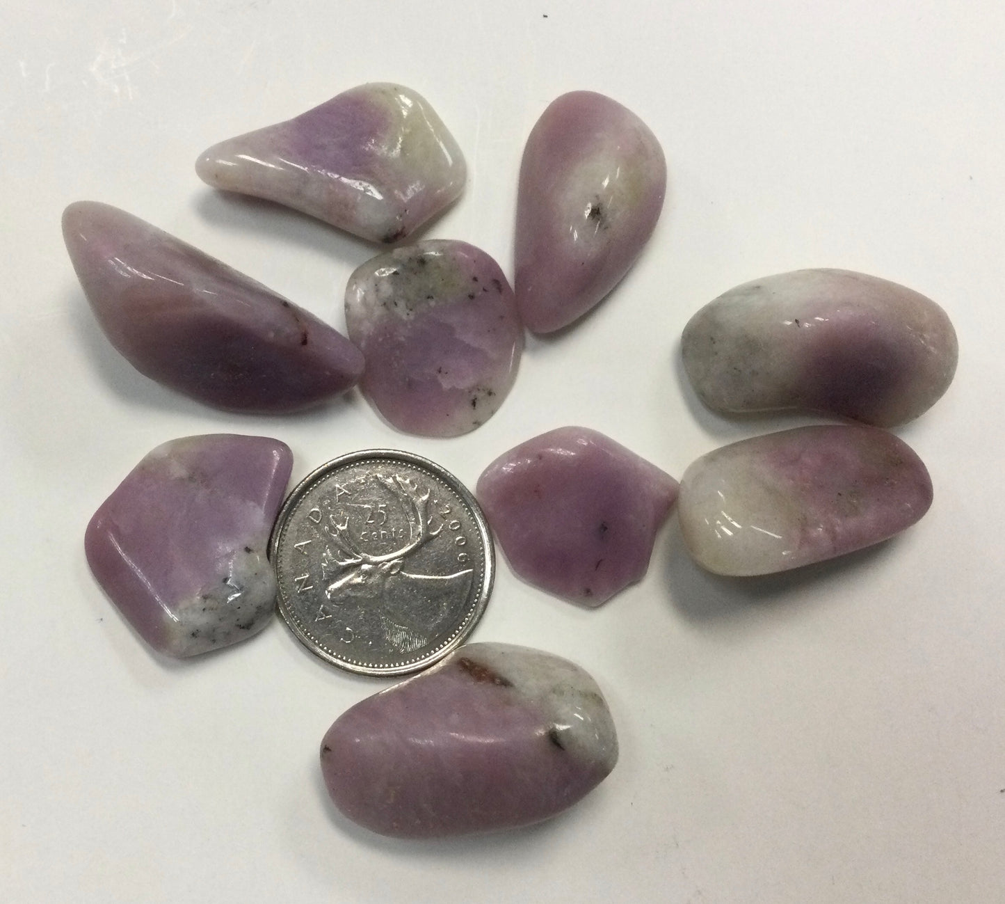 Lavender thulite, tumbled