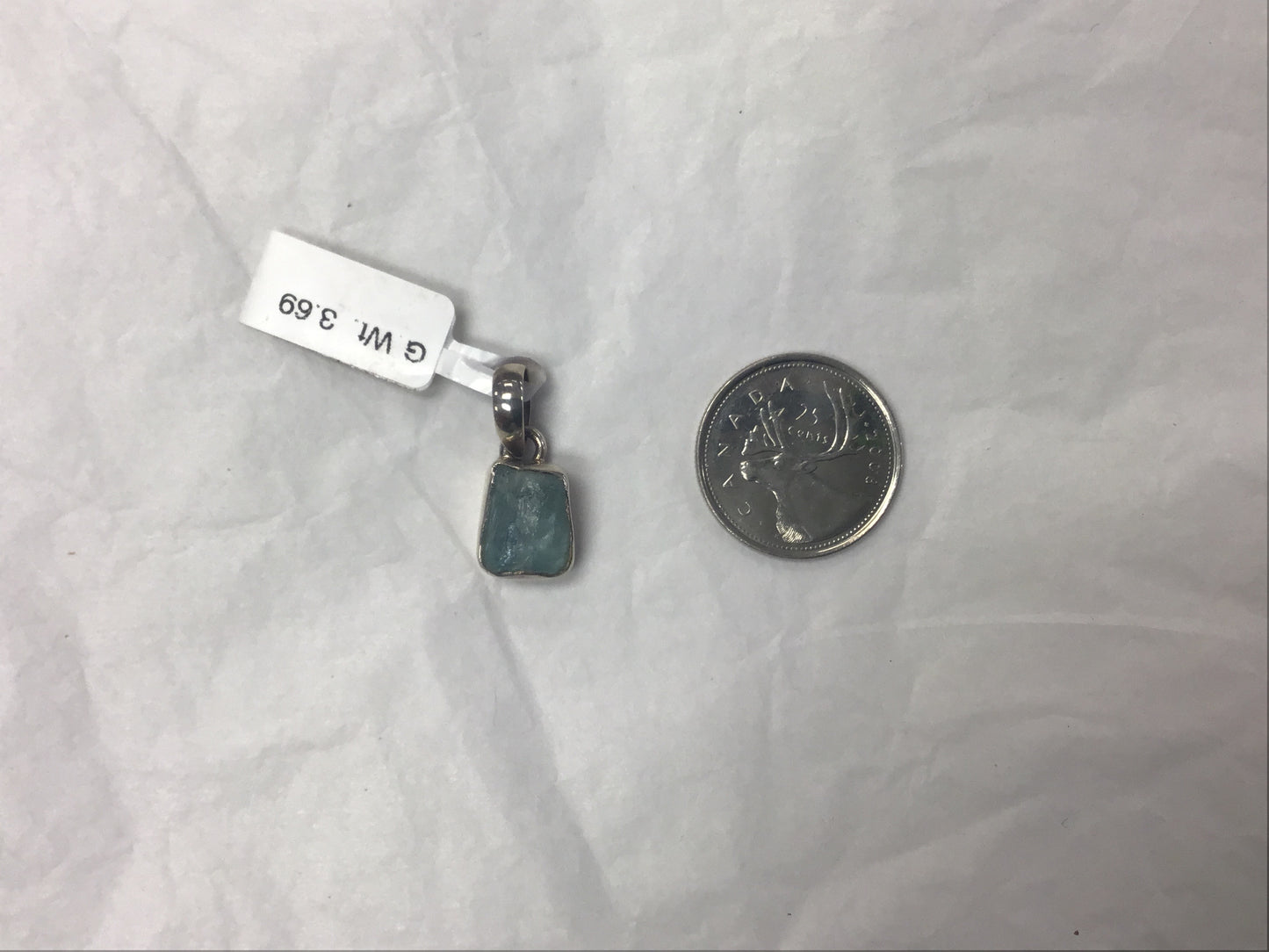 Rough aquamarine pendant