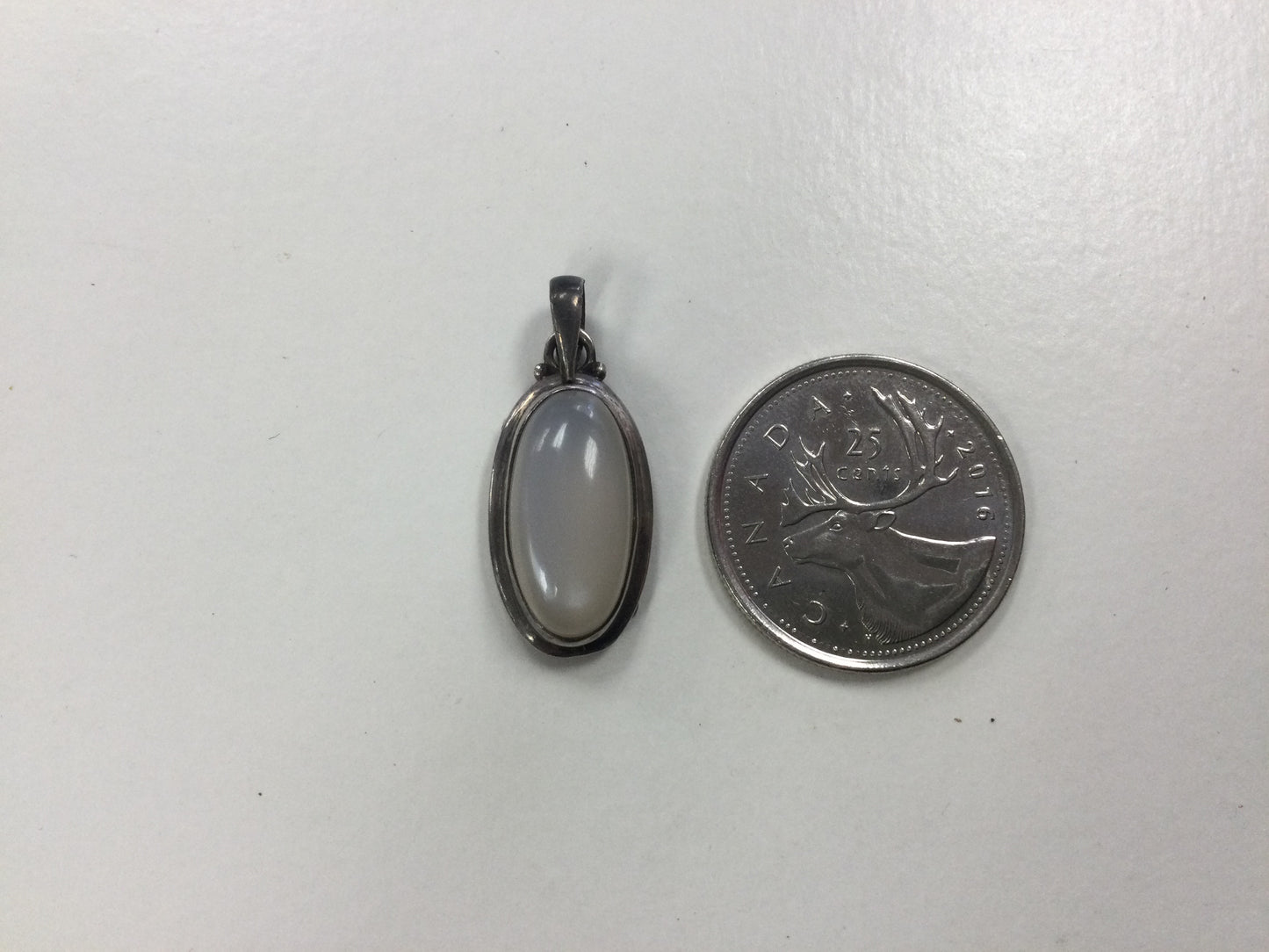 Moonstone Silver Faceted Pendant, slim oval