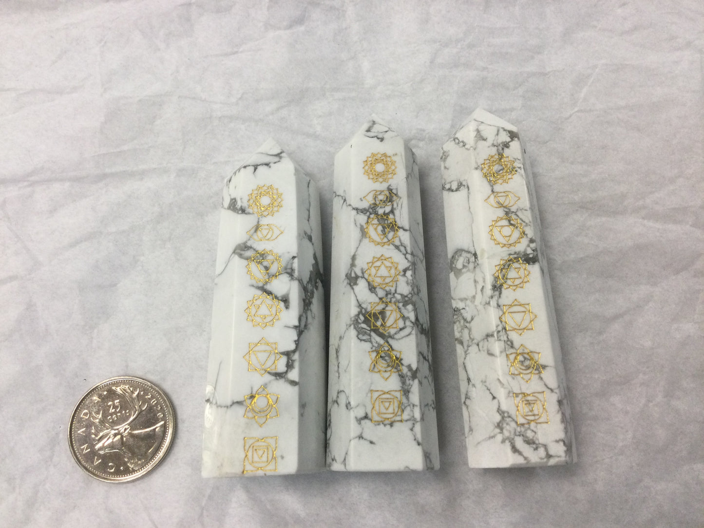 Howlite Point with Chakra Symbols