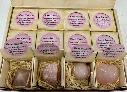 Assorted Rose Quartz shapes in a box (sphere, pyramid, rough, heart)