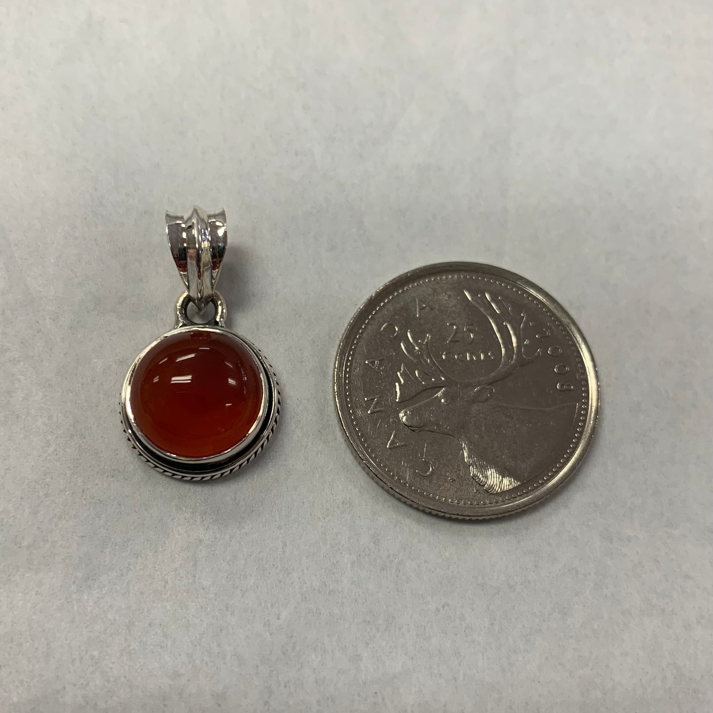 Carnelian Pendant Circular in silver