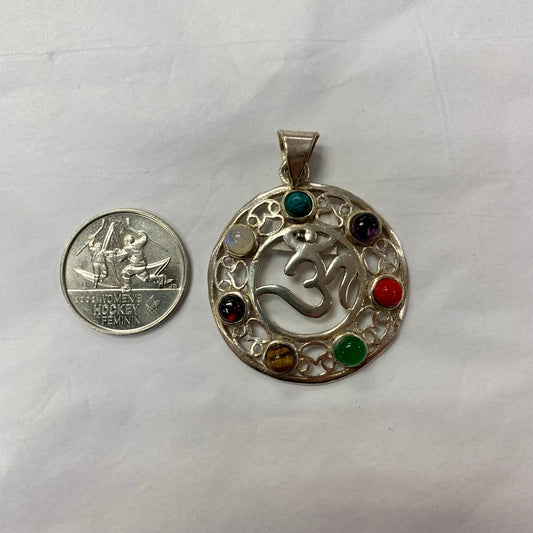 chakra pendant with OM in middle