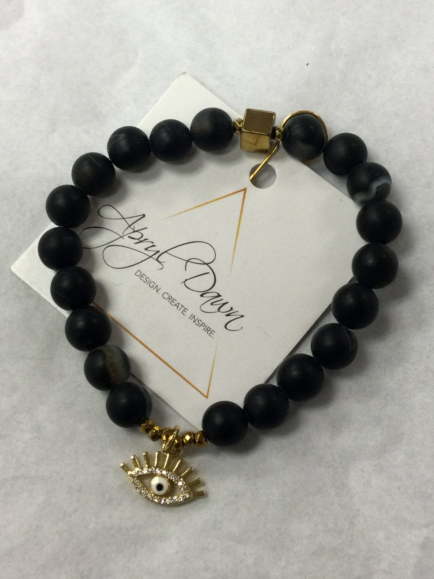 Apryl Dawn Matte Crystal Bracelet with Evil Eye Charm