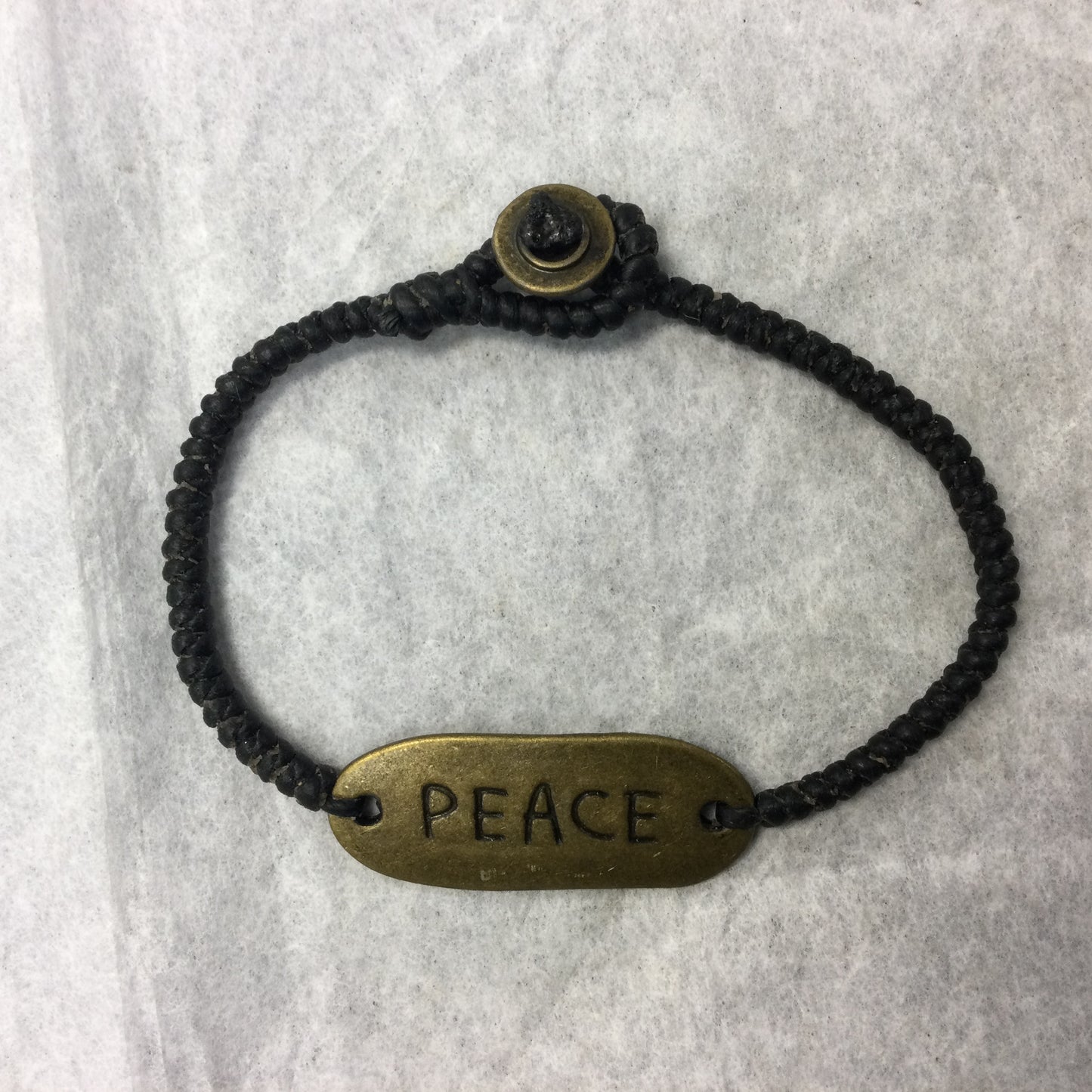 Woven Wax Cord Bracelet with Brass Peace Plaque