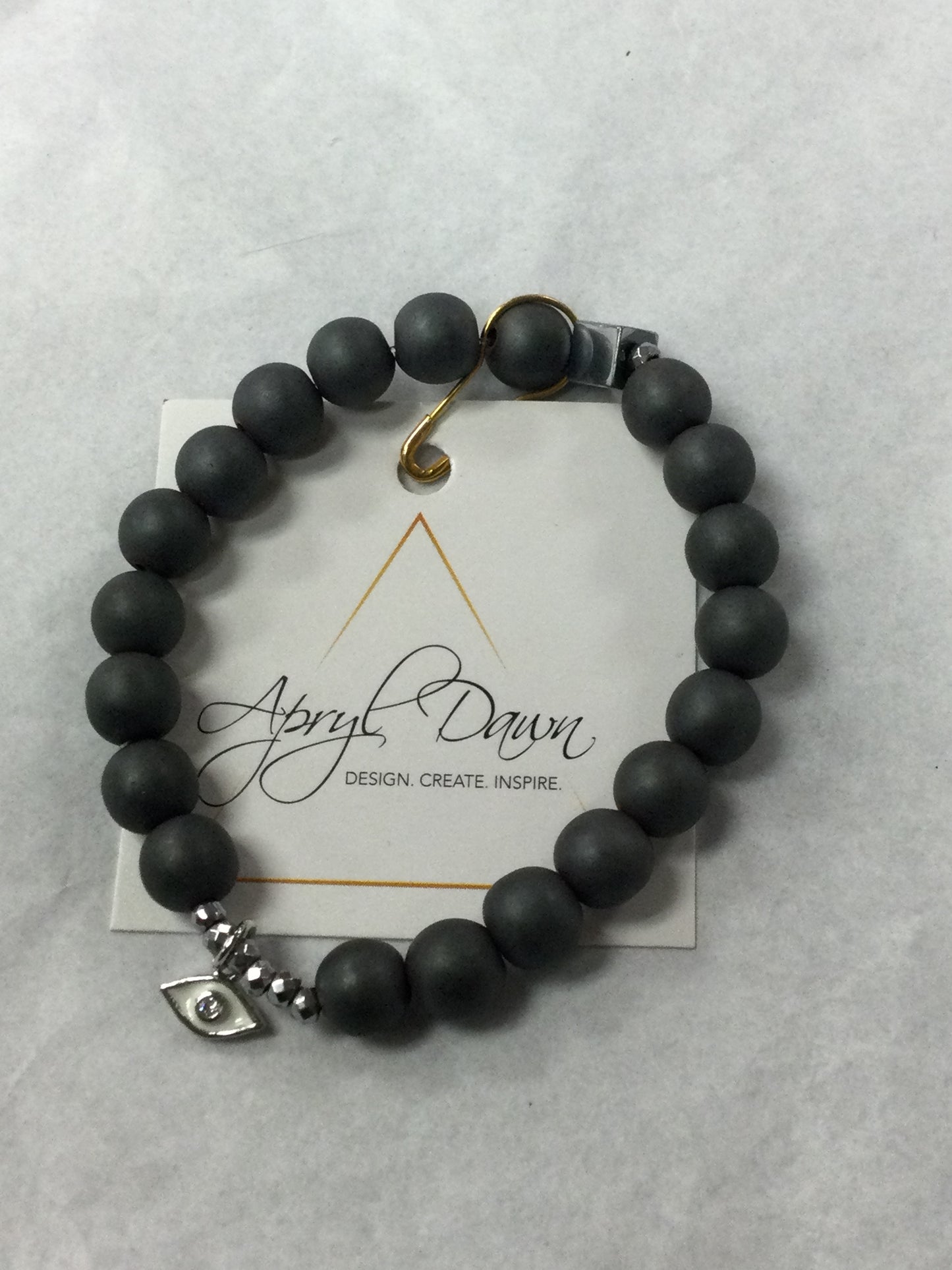 Apryl Dawn Matte Crystal Bracelet with Evil Eye Charm