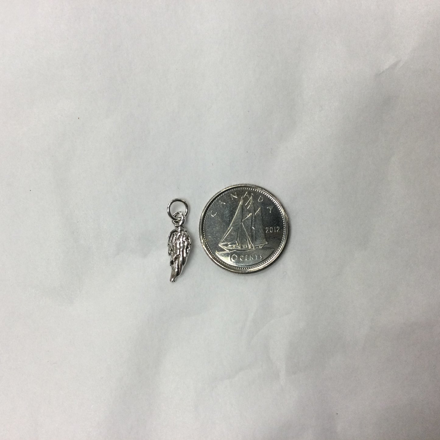 Tiny Silver Wing Pendant