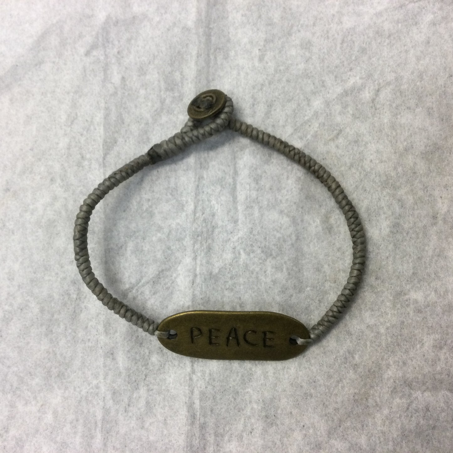 Woven Wax Cord Bracelet with Brass Peace Plaque