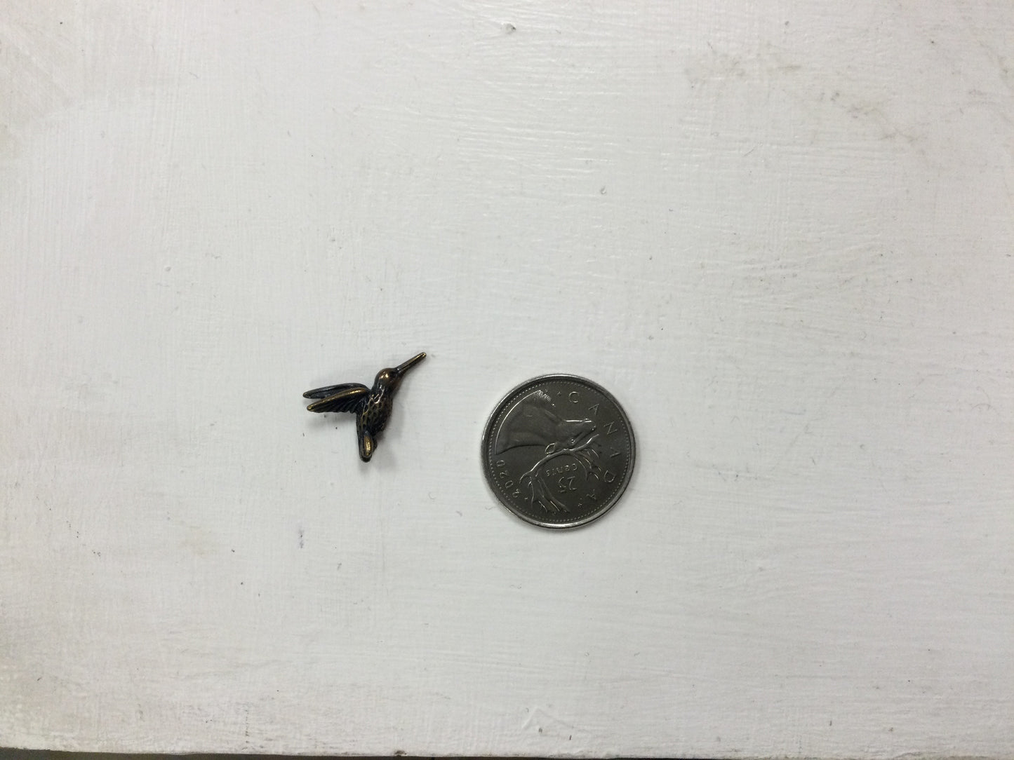 Antique brass plated hummingbird bead