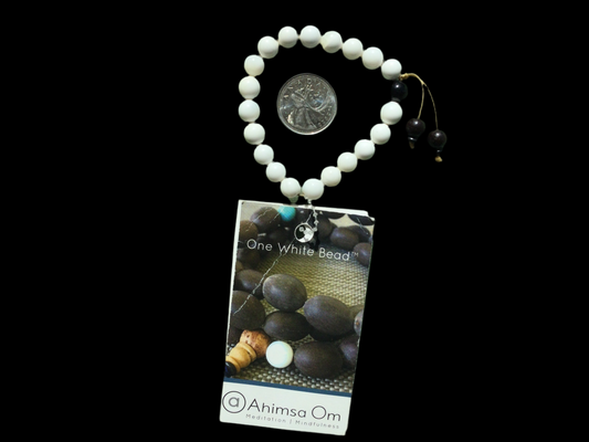One White Bead - Conch Shell