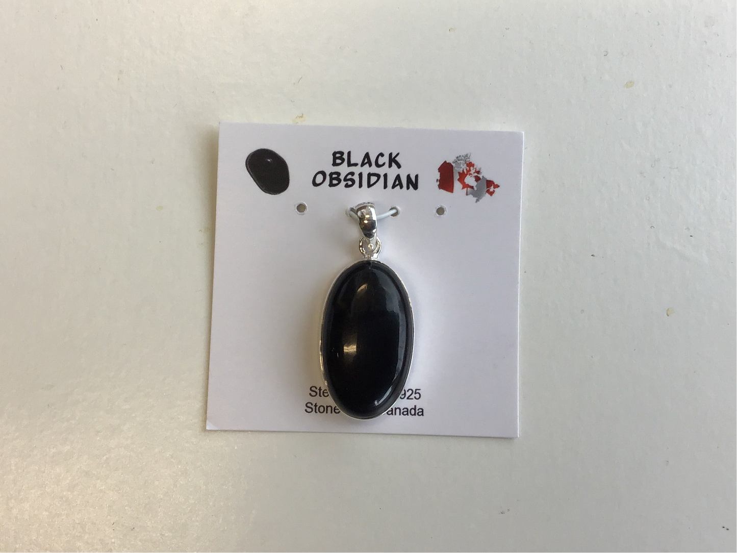 Polished Oval Black Obsidian Pendant