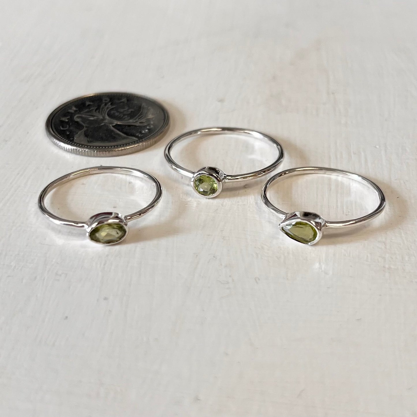 Simple 5mm Faceted Peridot Silver Ring