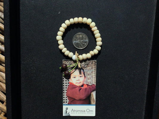 One White Bead - Tibetan Yak Bone