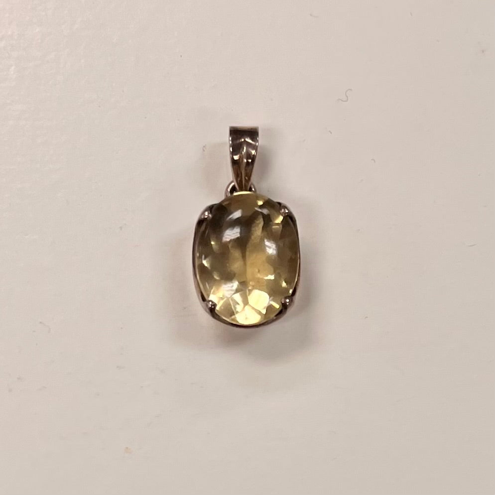 Lightly Faceted Oval Lemon Quartz Pendant in Silver