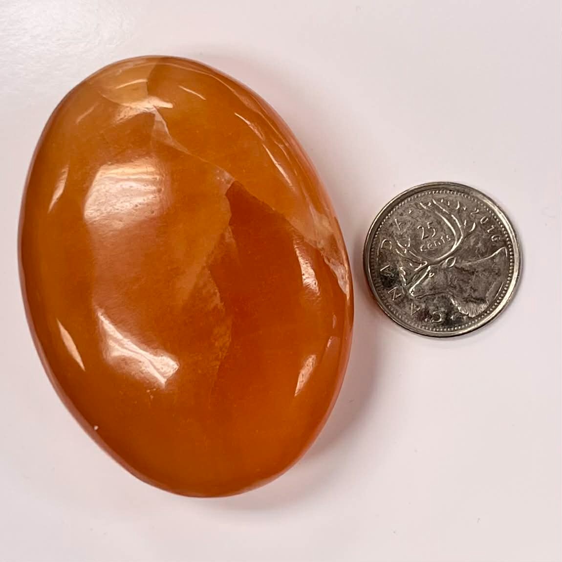Honey Calcite Palm Stone