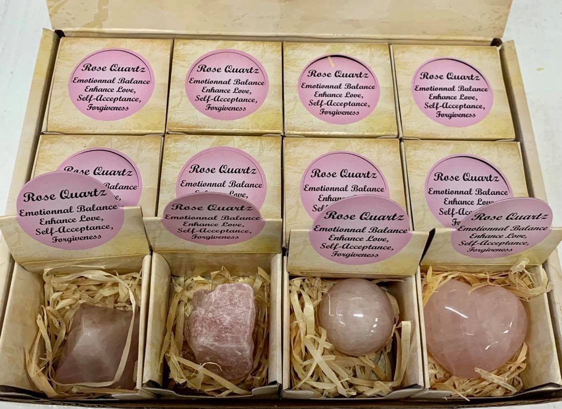 Assorted Rose Quartz shapes in a box (sphere, pyramid, rough, heart)