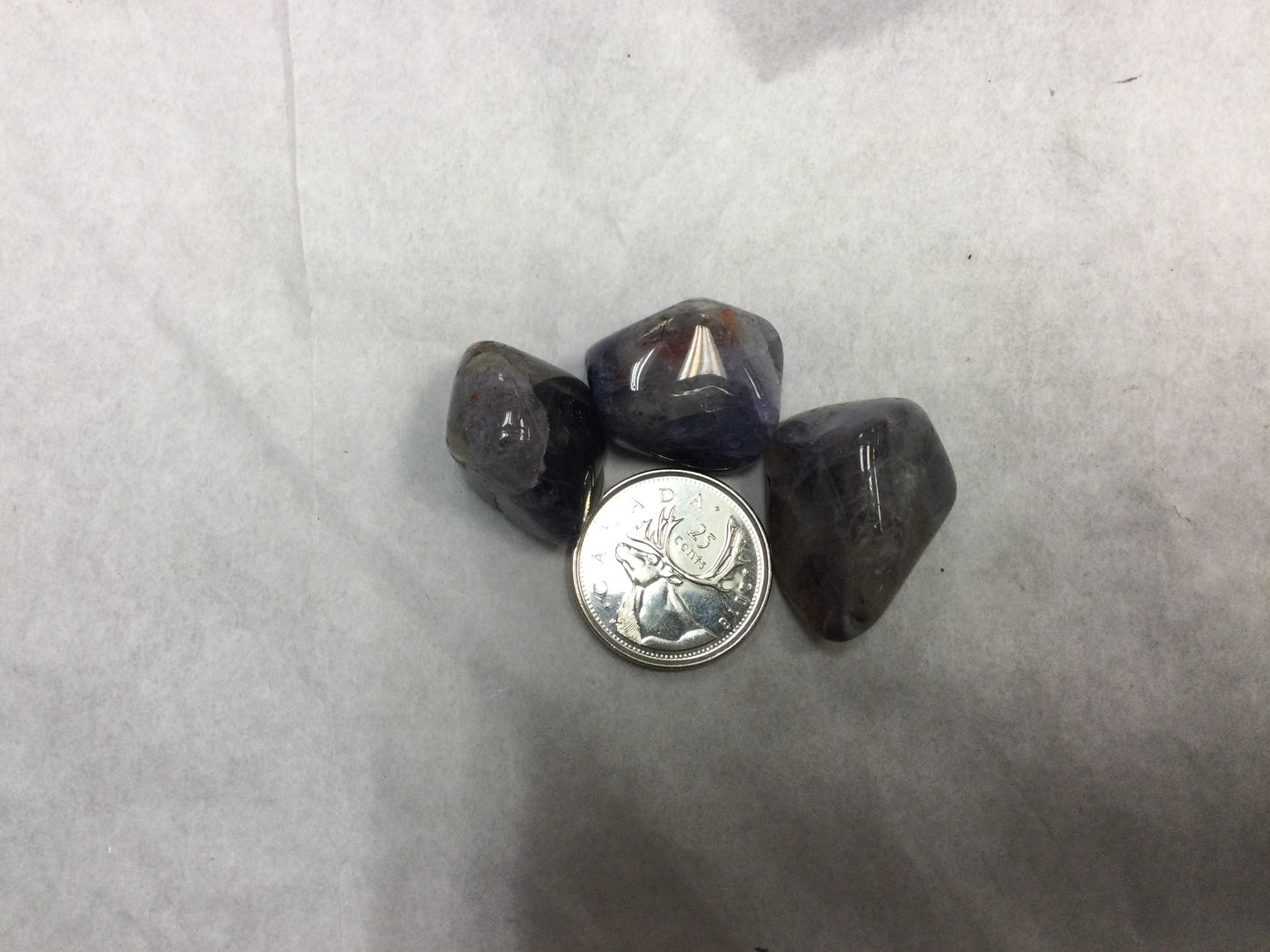 Iolite with sunstone, tumbled