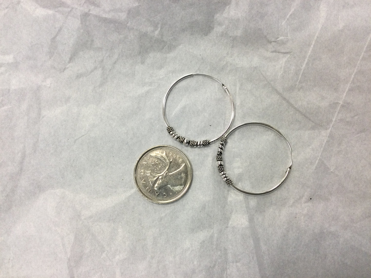 Silver hoop earrings with ball and coil 1”