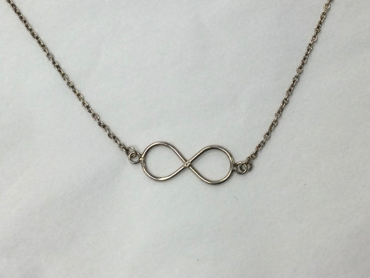 Silver Necklace With Attached Infinity Pendant