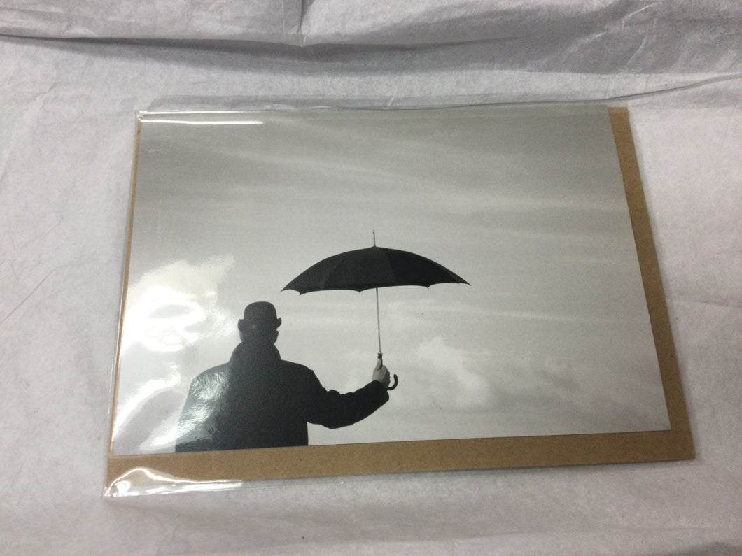 card, b/w man with umbrella