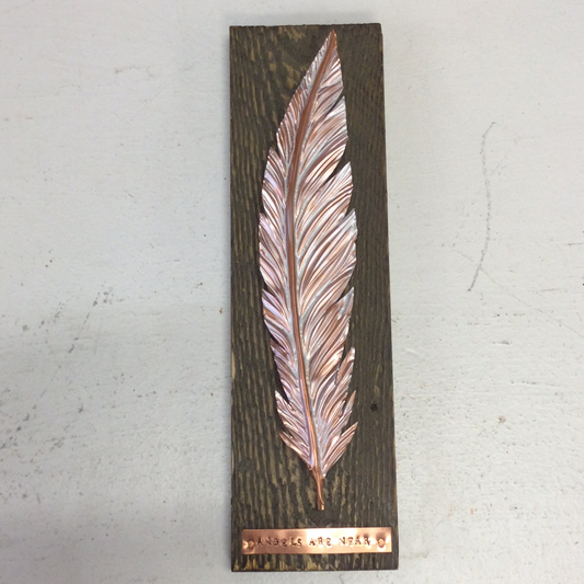 Copper Angel Feather on wood