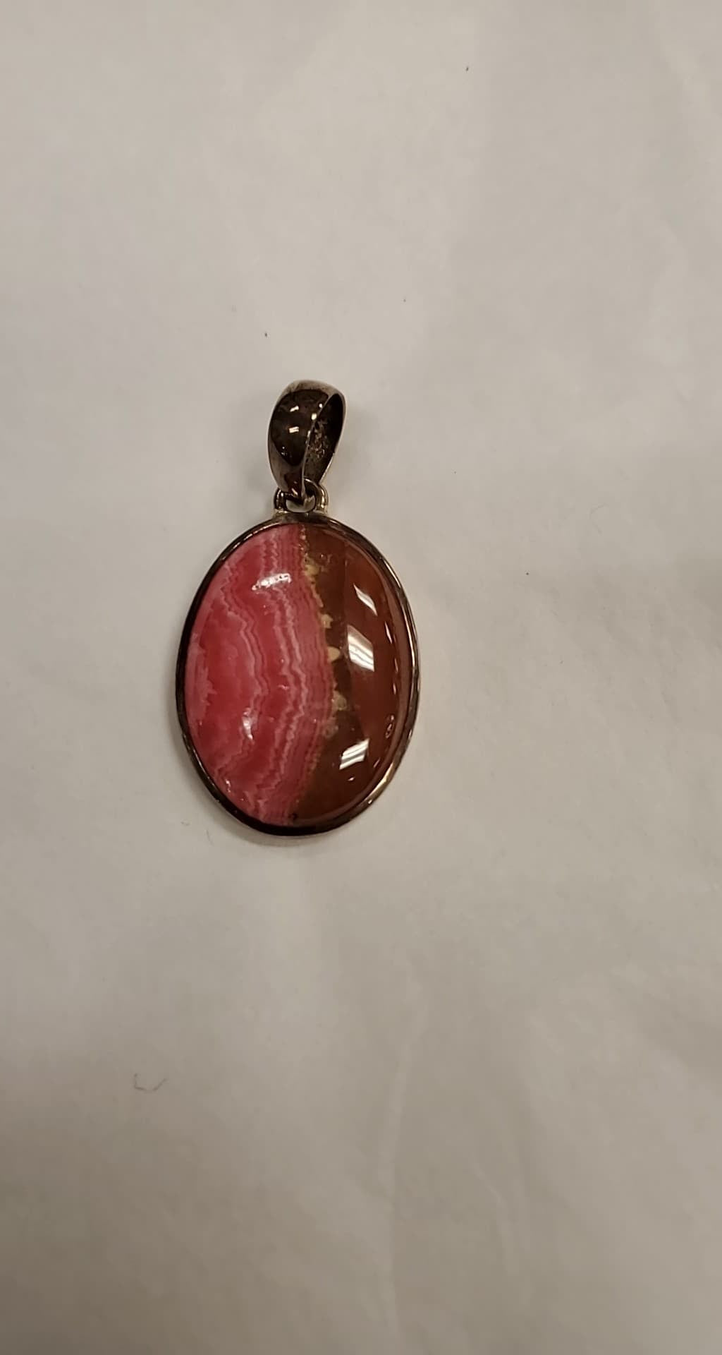 Oval Phodocrosite Pendant w/ Brown Stripe